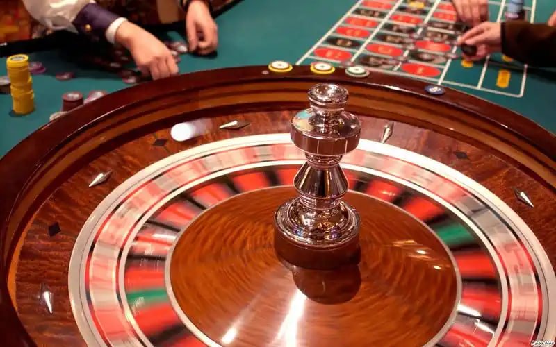 result kamboja live-dealer Colok Naga table with HD camera showing card shuffle and dealer